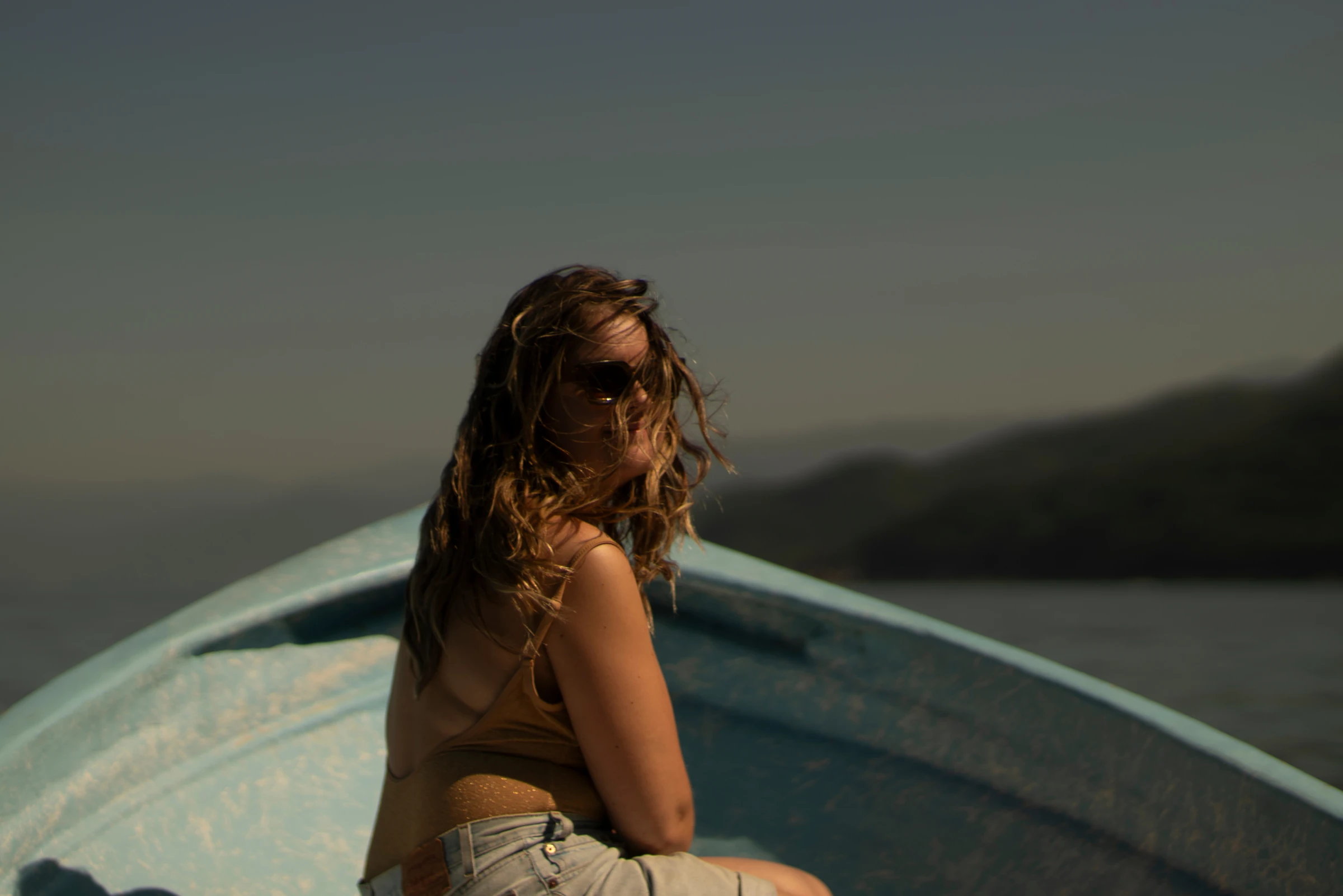 A woman traveling by boat