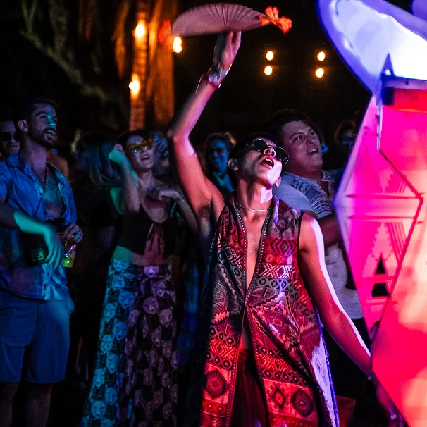 Dancers under colored lights