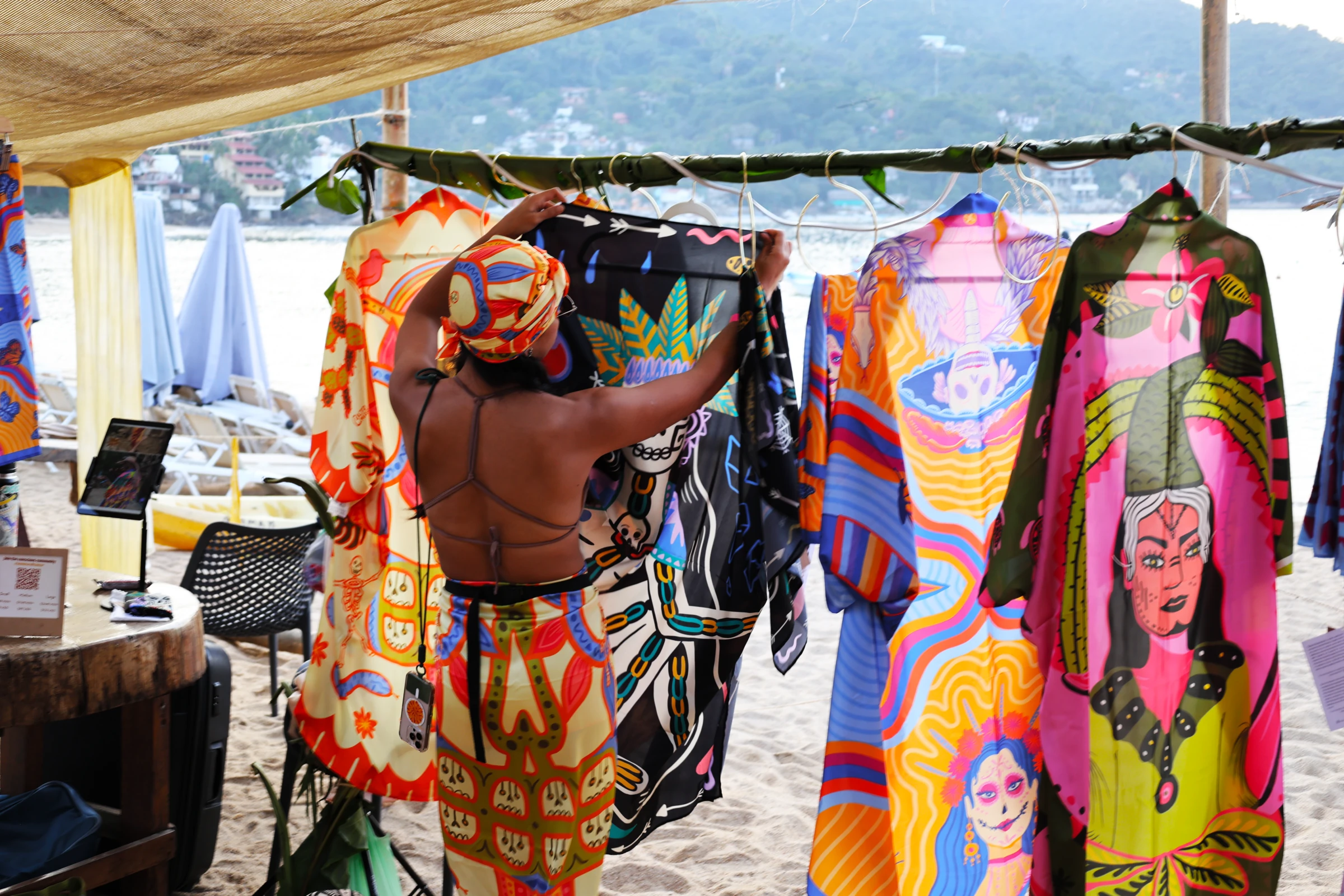 Colorful clothing displayed at a market stall